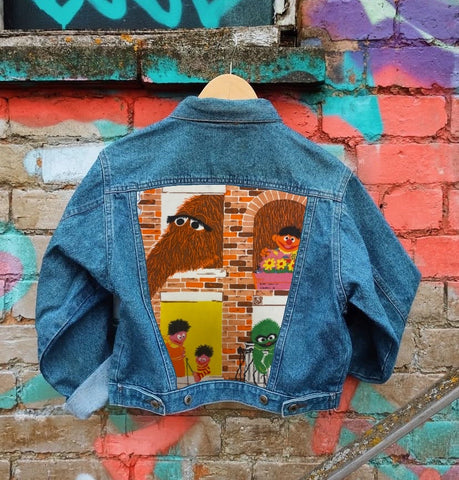 Send in your denim jacket + we'll sew on this panel!