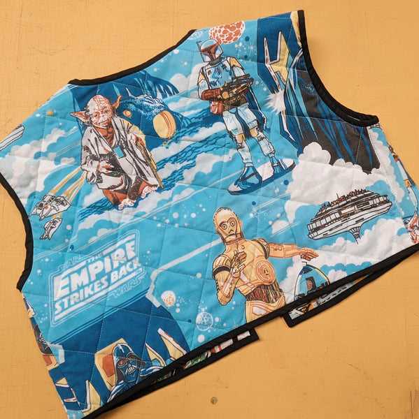 Padded double sided vest made with Reworked Duvet Cover.